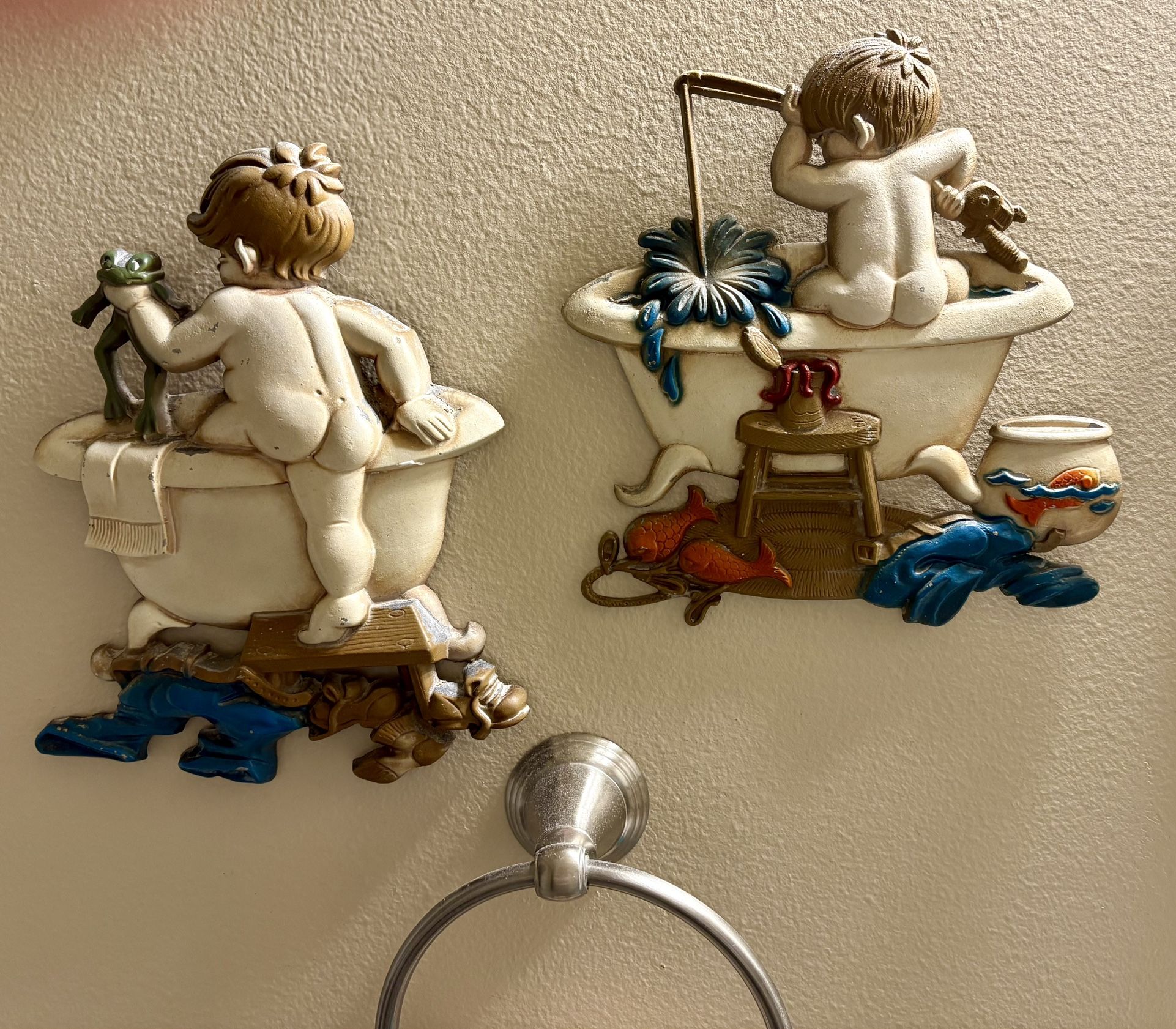 A Pair of Vintage Sexton Metal Bathroom Wall Plaques