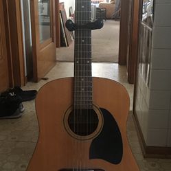 Used Guitar With Stand
