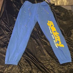 Blue and yellow spider sweats rarely worn like new 