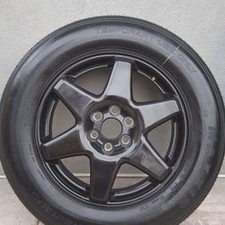 A spare tire (R16) with 100% tread life for a Chevy—$50