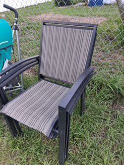 THREE VERY NICE MATCHING STACKABLE PATIO CHAIRS