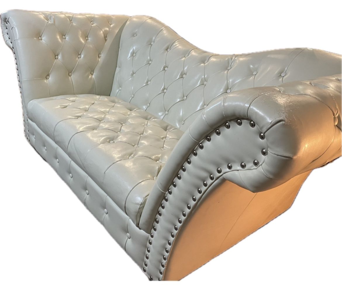Elegant Tufted Cream Faux Leather Sofa