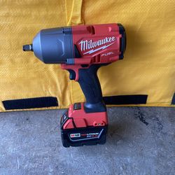 Milwaukee, 18 V half-inch impact wrench with 5.0 battery.