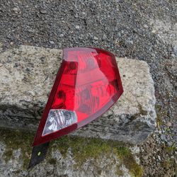 Passenger / Right Tail light for a 2003 to 2007 Saturn ion  4 Door Sedan in excellent condition. 