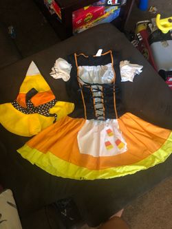 Candy corn which costume size small/medium or looks like will fit girls size 10 to 12
