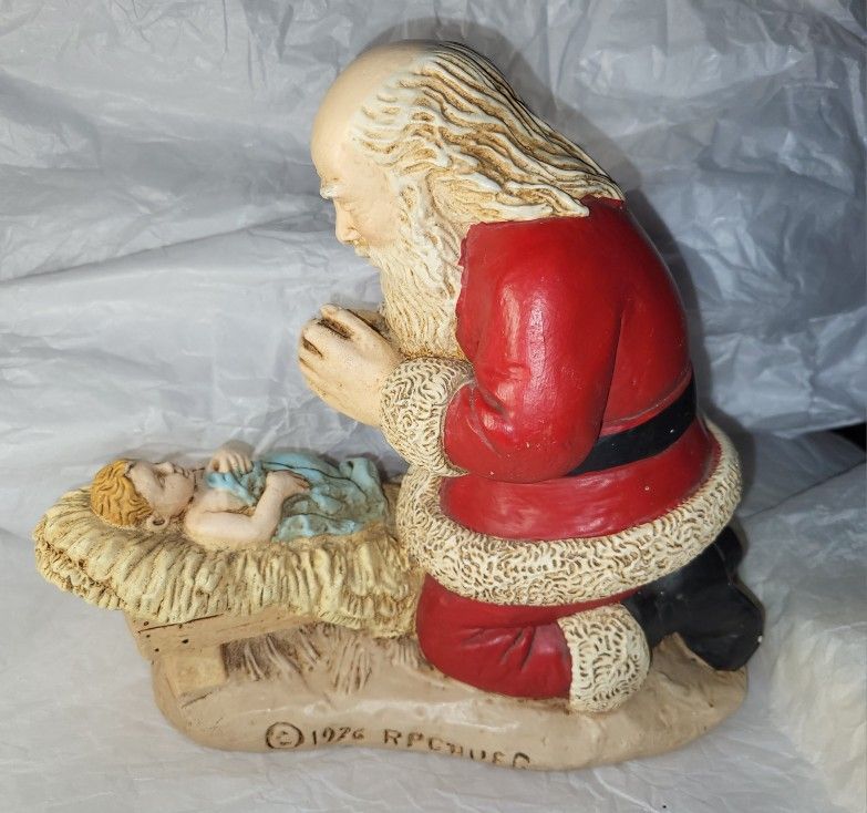 Kneeling Santa praying over Baby Jesus 1976 RP Gauer