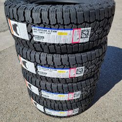 285 70 17 FALKEN WILDPEAK AT4W TIRES SILVERADO SUBURBAN AVALANCHE TAHOE SIERRA F150 RAM RUBICON GLADIATOR TUNDRA TITAN 