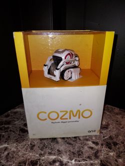 Anki Cozmo Robot Toy With Cubes And Charger 500mah Battery. The bot is white and red