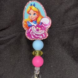 Badge Reel Alice In Wonderland 