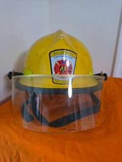 Firefighter Helmet Cairns & Brother N660C
BALTIMORE CITY "Pride Protecting People" 1797 FIRE SERVICE
ROGER STAMP 6-28-97- What A Sweet Heart !