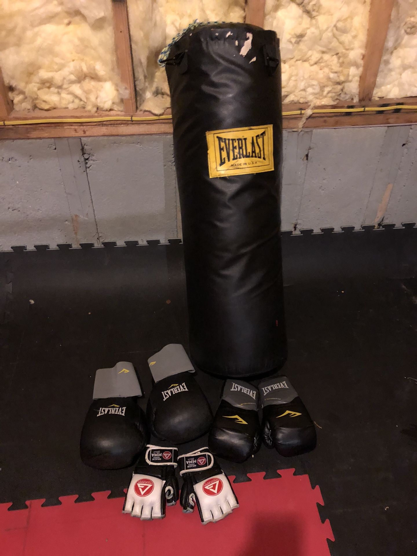 Boxing bag with 2 pairs of boxing gloves and pair of mma gloves