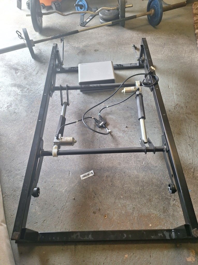 Electric adjustable bed frame with remote control