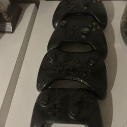 Xbox Controllers (2), Nintendo Switch Controller (1) And Generic Pro Gamepad (1)