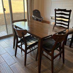 Walnut table and 4 chairs 