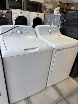 Hotpoint top load washer and gas dryer set