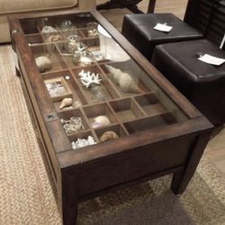 Pottery Barn Townsend Shadowbox Coffee Table  Glass top with 20 shallow compartments for display items. 