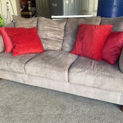 Couch With Red Throw Pillows 