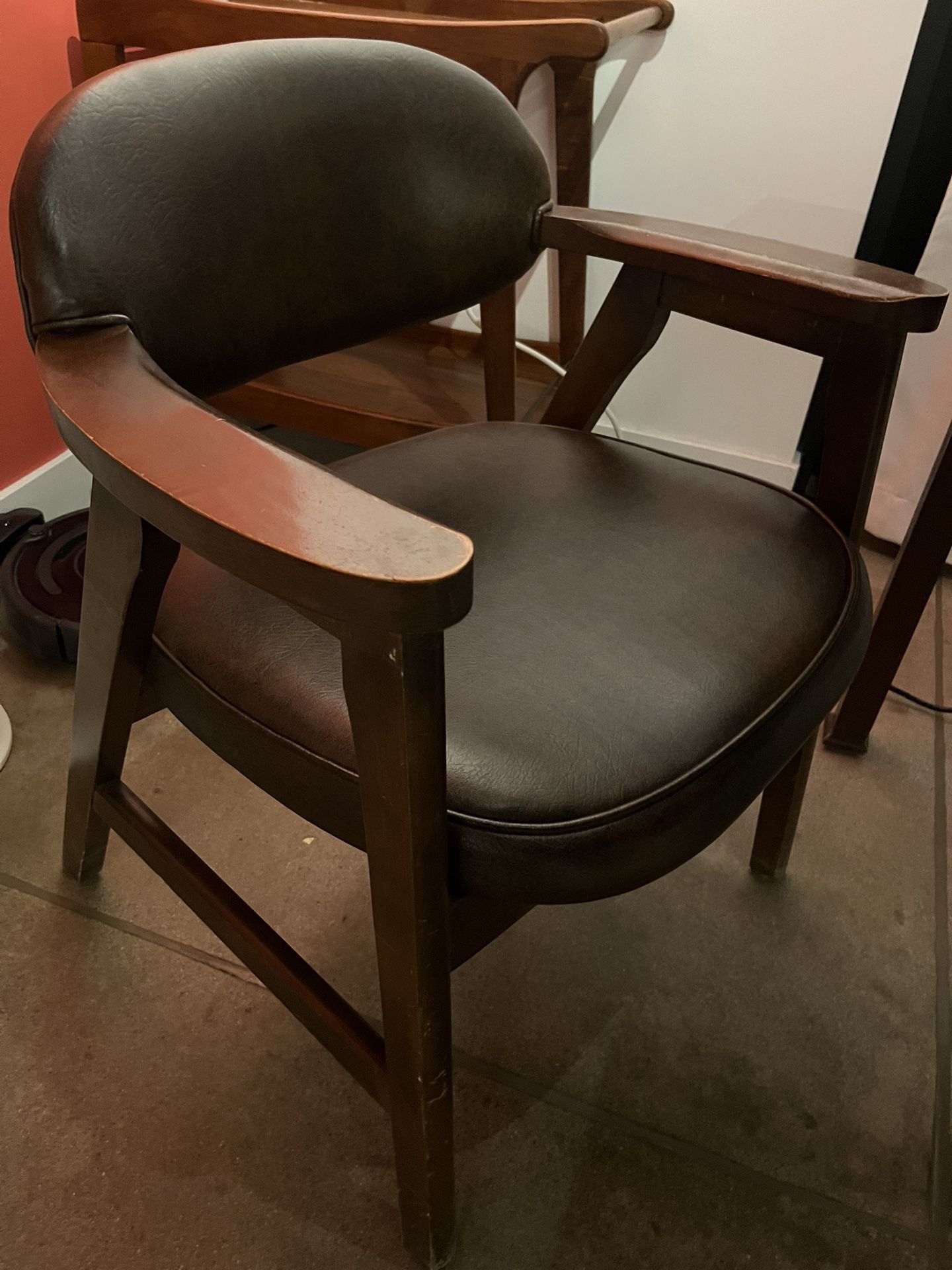 Two Leather And Wood Chairs