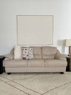 Creamy leather couch comfy!