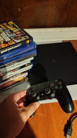 Ps4 slim bundle 1tb 14 games with everything tested working great