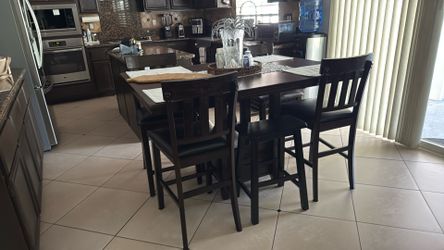 Dining table 4 chairs, two stools