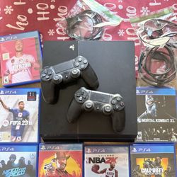 PS4 With Games And HDMI Cable