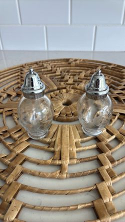 Pretty set of salt and pepper shakers with etched glass