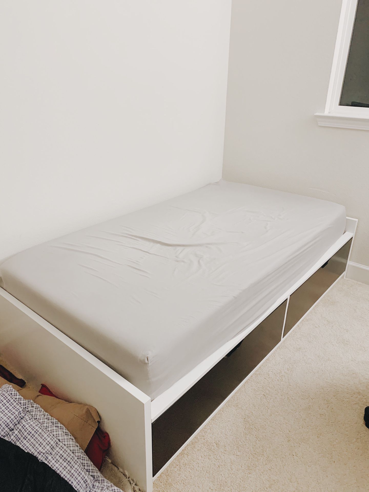 IKEA bed frame and tuft & needle mattress