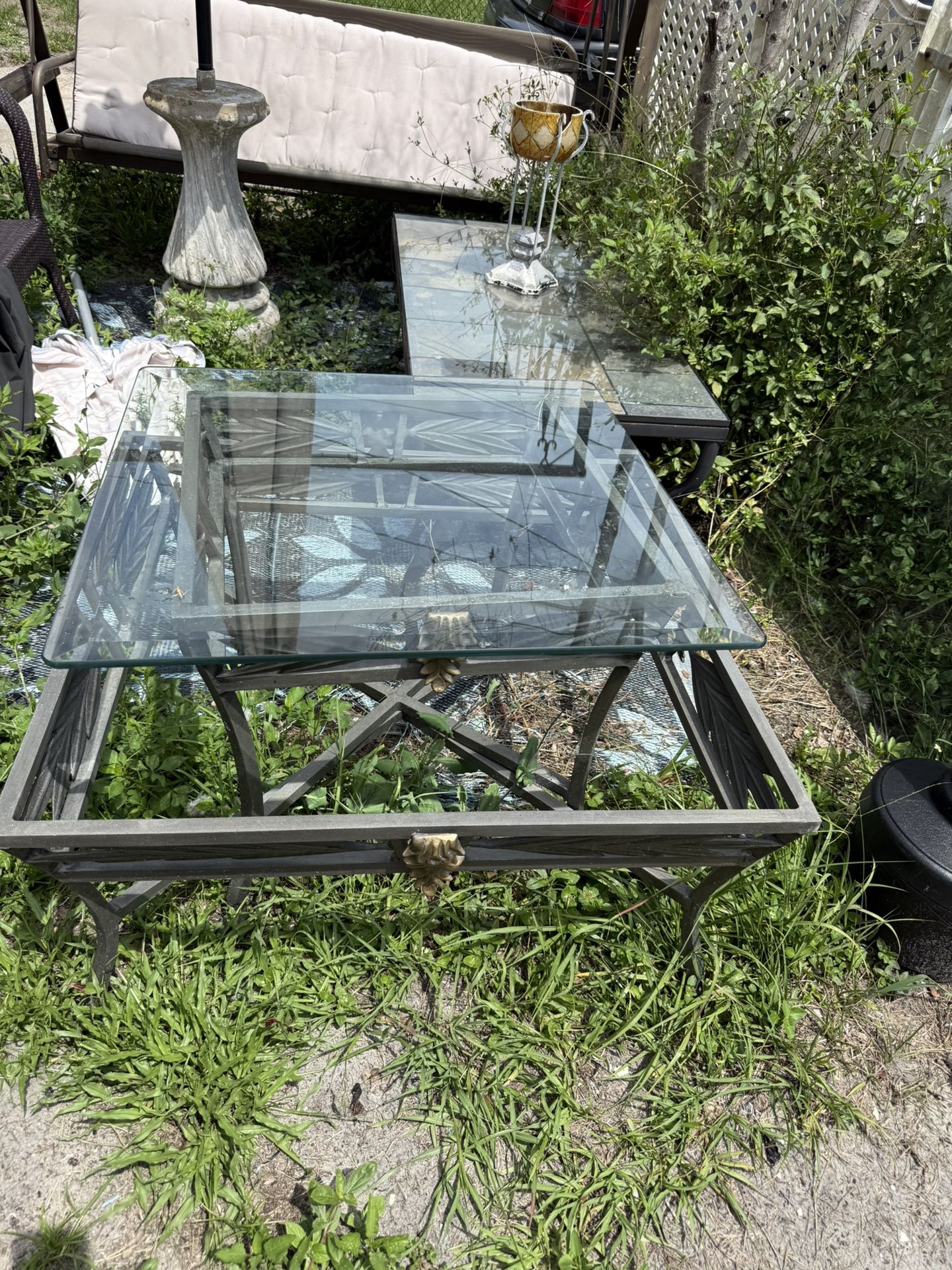 A Metal End Table Or A Squared Coffee Table With Class