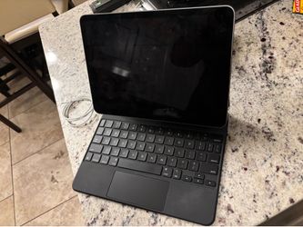 iPad Air 5th Gen with Magic Keyboard.