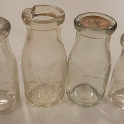 4 Vintage Embossed Milk Bottles