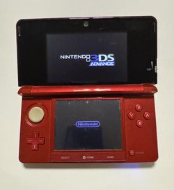 Flame Red Nintendo 3DS with 688 games 