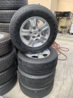 OEM toyota tundra wheels size 18" with tires all terrain $380 wheels and tires