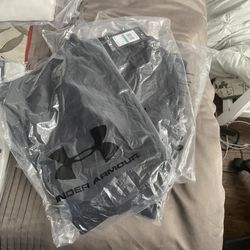 Under Armor Shirts, Shorts, And Cleats 