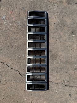 Jeep XJ OEM Chrome Grill 1984 through 1996
