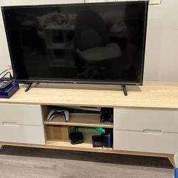 Modern light wood and white TV stand