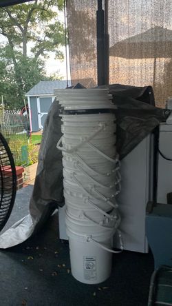 Stack of buckets with lids