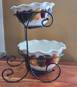 Home Interiors Sonoma Villa 2-tiered decorative fruit bowl set with a black metal stand.