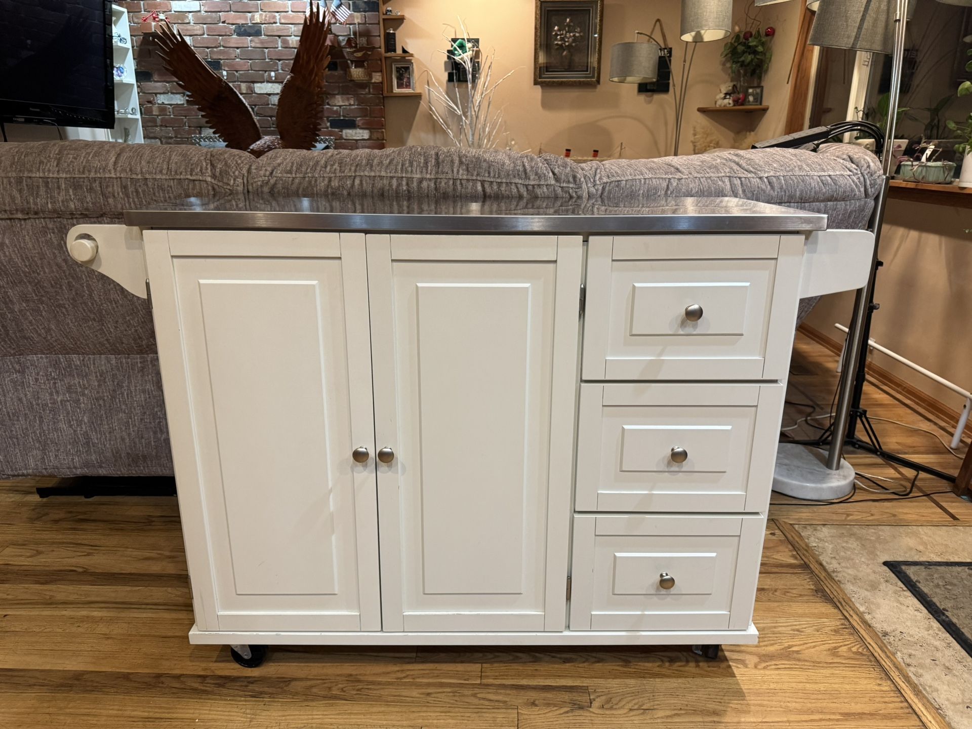 Mobile kitchen island with stainless steel top on Wheels