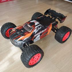 RC Truck with custom belted tire and regular tires included...everything. SUPER FAST!!!