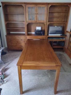 Beautiful solid wood wall unit with two-sided desk