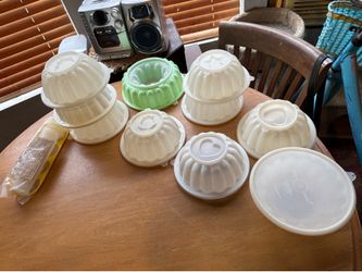 Tupperware molds $5. Comes with one shape. Additional $1 each. Rochester wa.