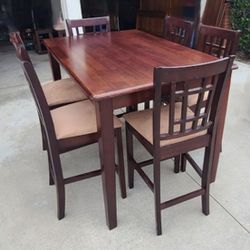Taking best offer. Solid Wood Expendable Dining Room Table Set With 6 Cushioned Chairs, Great Condition. Dimensions Below. Taking Best Offer. 