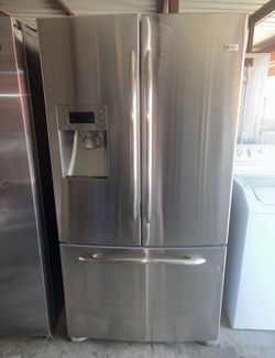 GE Stainless Steel Refrigerator And Freezer