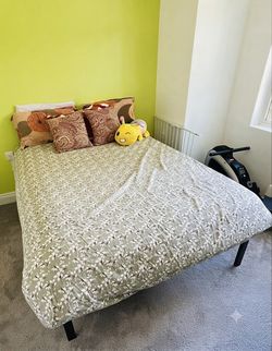 Full size wooden slate and metal frame bed with 9 inch mattress