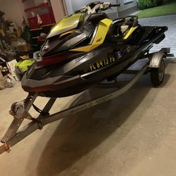 Yellow and Black Sea-Doo Jet Ski