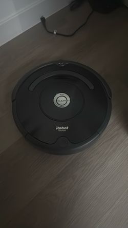 iRobot Roomba Robot Vacuum with charging dock