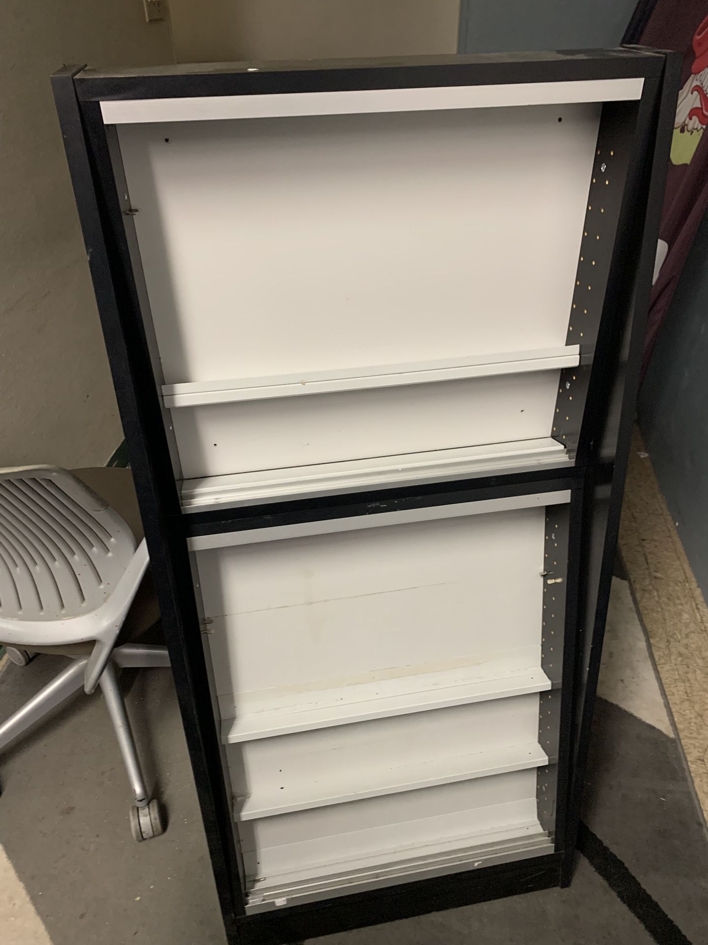 Show Case Small Has Glass Doors For Front