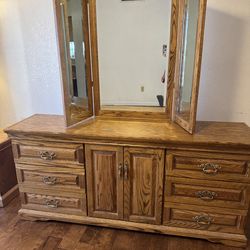 Dresser with mirror, and two nightstands