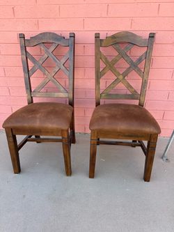 Six Brown Wood Dining Chairs